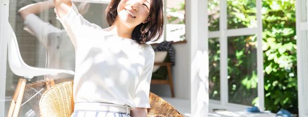 Modern living room with sunlight streaming through UV-protective windows