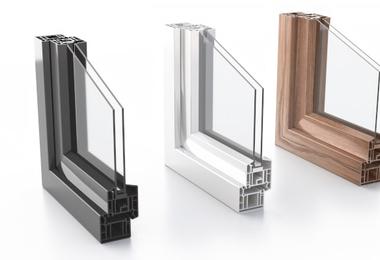 Aluminum window frame profile showing double-glazed glass panels, used for comparing frame materials in Canadian homes