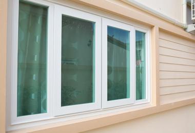 Impact-resistant window with blinds in a modern Canadian home interior