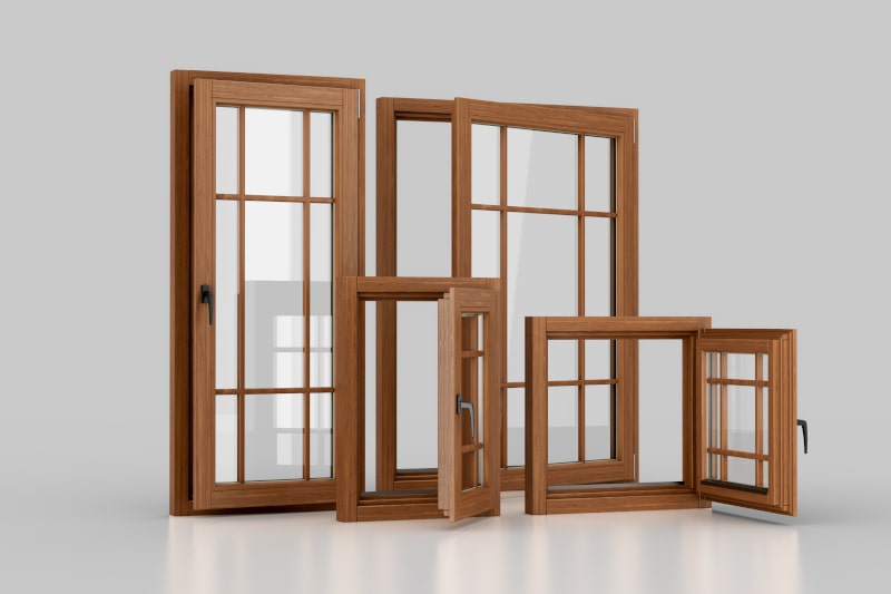 Set of brown wooden-framed windows in various designs and finishes
