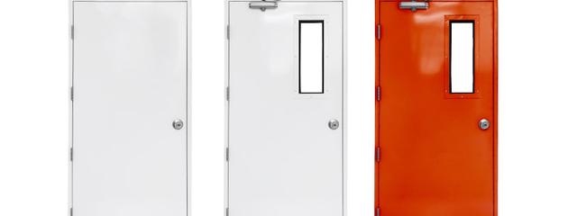 Variety of fire exit doors in a modern Canadian condominium hallway