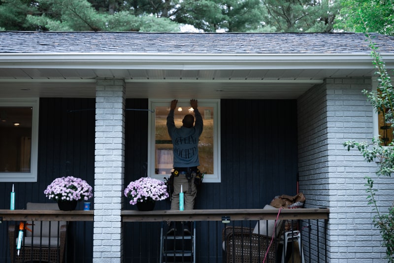 House exterior with custom-designed windows and symmetry
