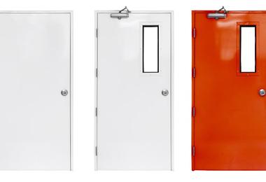 Variety of fire exit doors in a modern Canadian condominium hallway