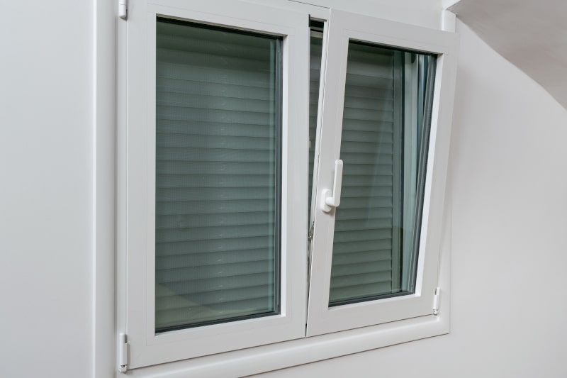 Tilt and turn aluminum window shown in open position