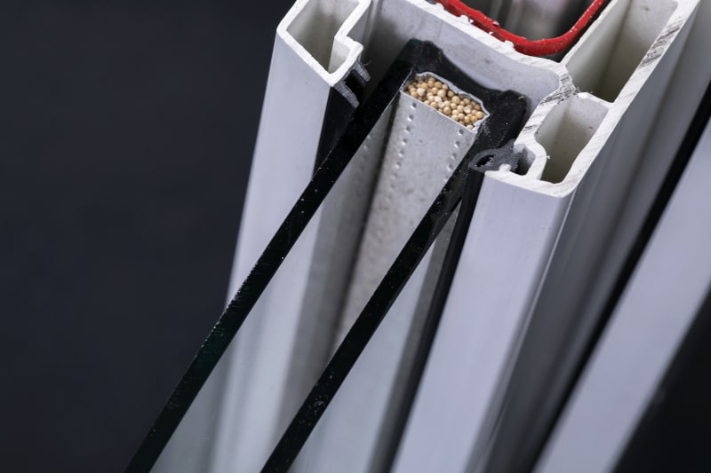 Triple-glazed window profile with warm-edge spacer system