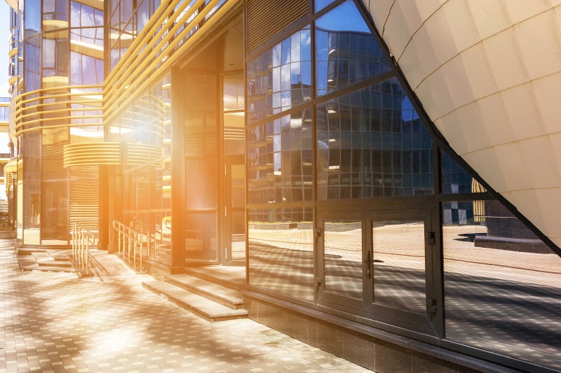 Technician installing energy-efficient vinyl windows with UV-blocking features